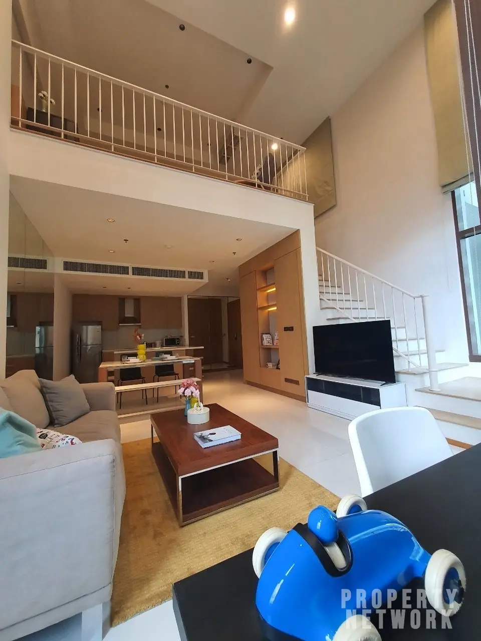 Luxurious 1-bedroom condo for rent at The Emporio Place, Sukhumvit 24. Spacious 95 sqm unit with modern furnishings and world-class amenities. THB 49,000/month near BTS Phrom Phong