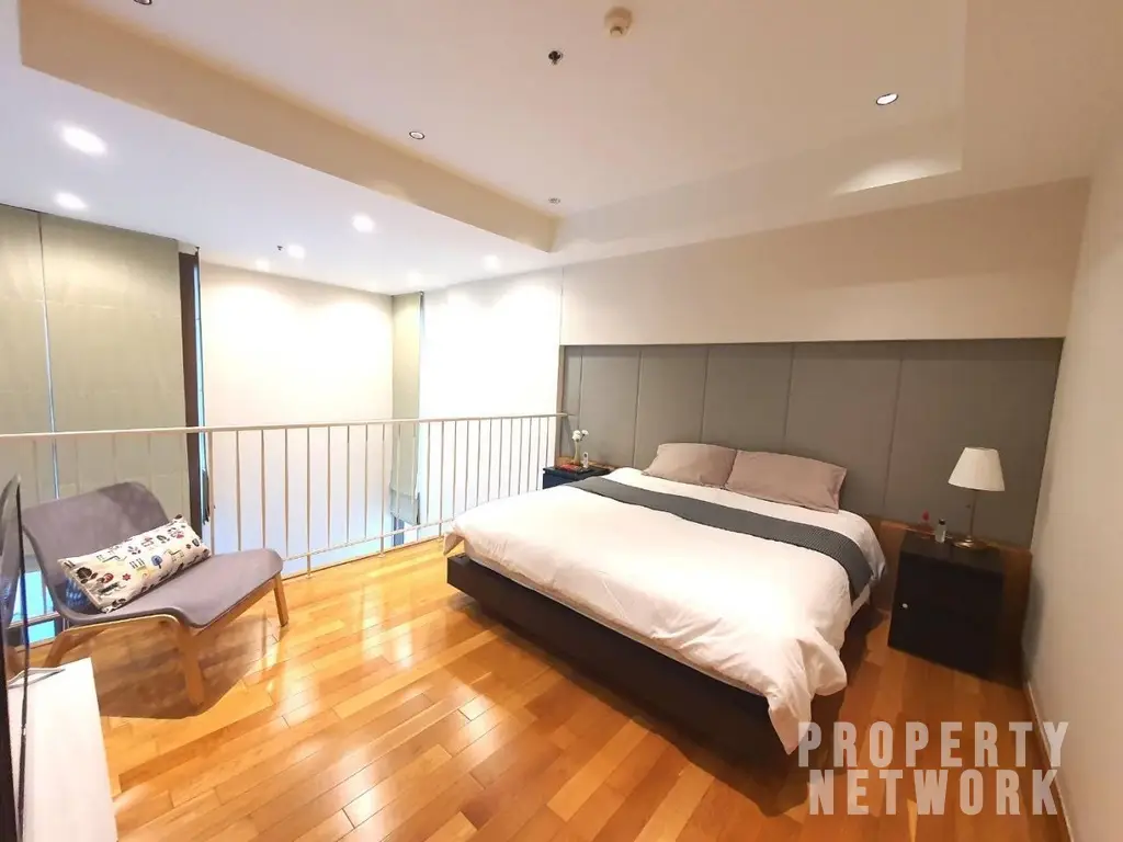Luxurious 1-bedroom condo for rent at The Emporio Place, Sukhumvit 24. Spacious 95 sqm unit with modern furnishings and world-class amenities. THB 49,000/month near BTS Phrom Phong