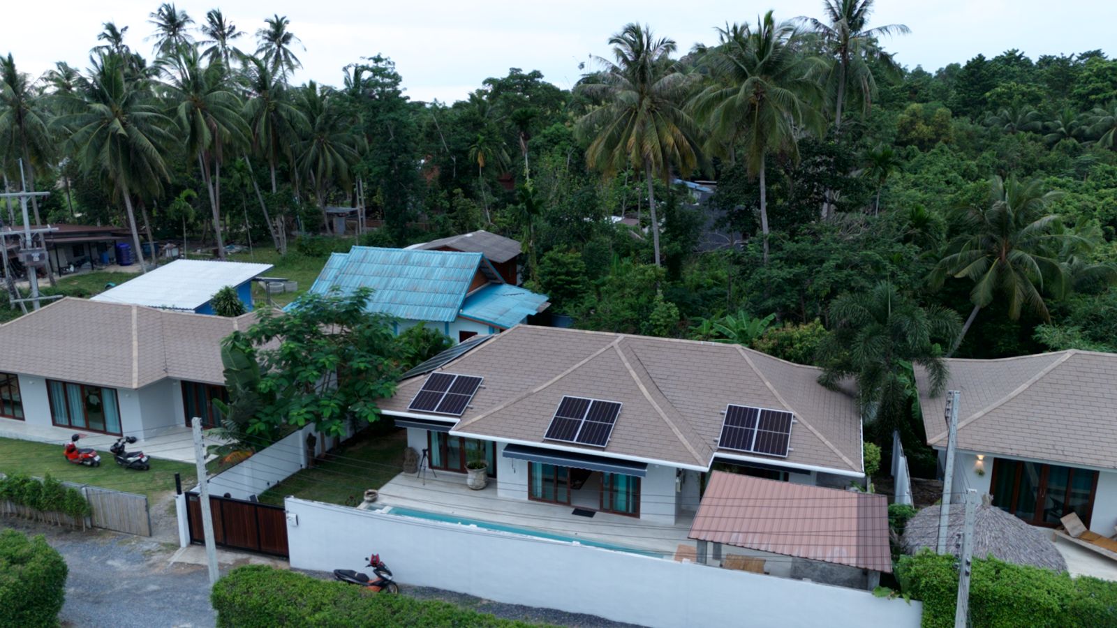 Luxurious 2-bedroom villa with pool in Koh Phangan for sale at 10,5M THB. Features eco-friendly design, solar panels, and serene island living.