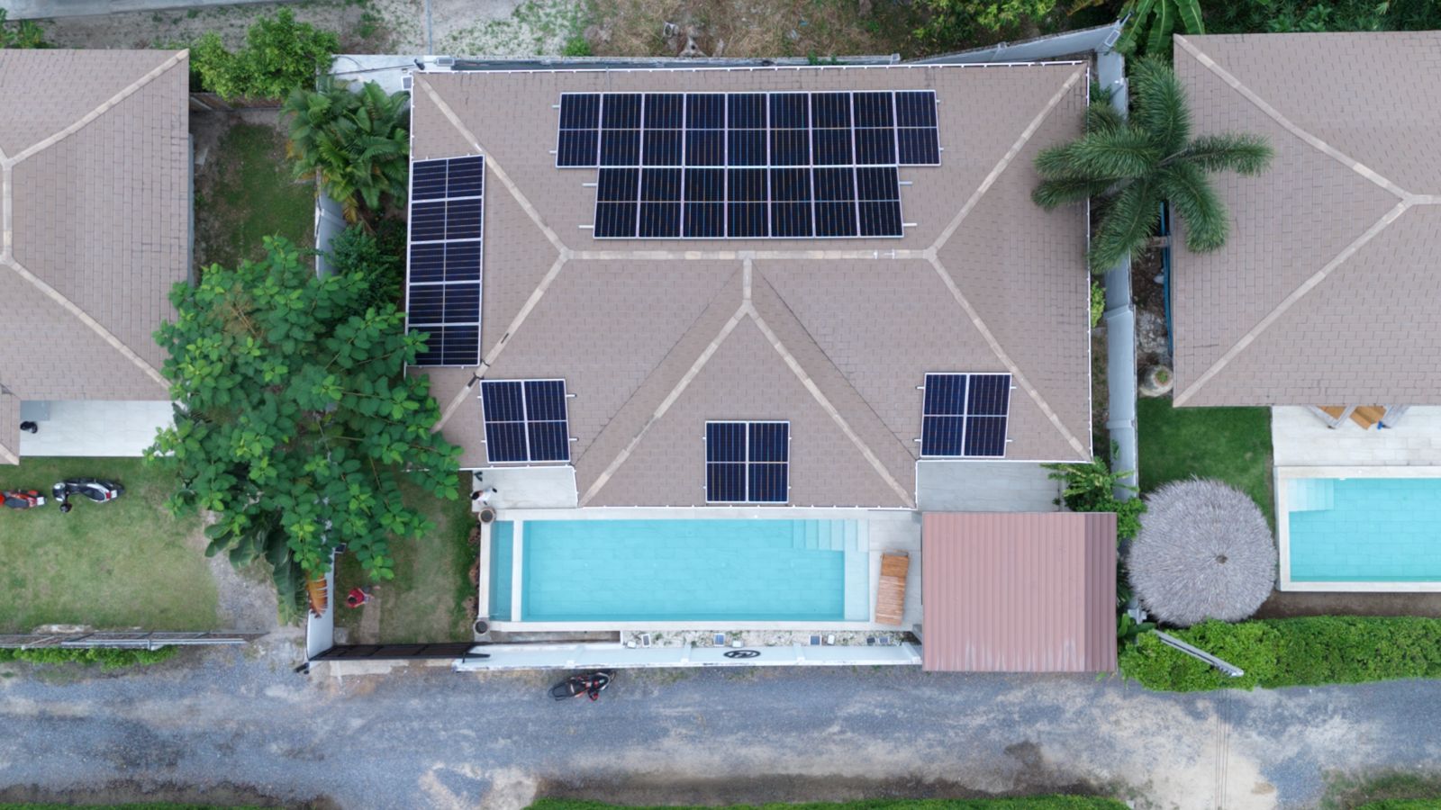 Luxurious 2-bedroom villa with pool in Koh Phangan for sale at 10,5M THB. Features eco-friendly design, solar panels, and serene island living.