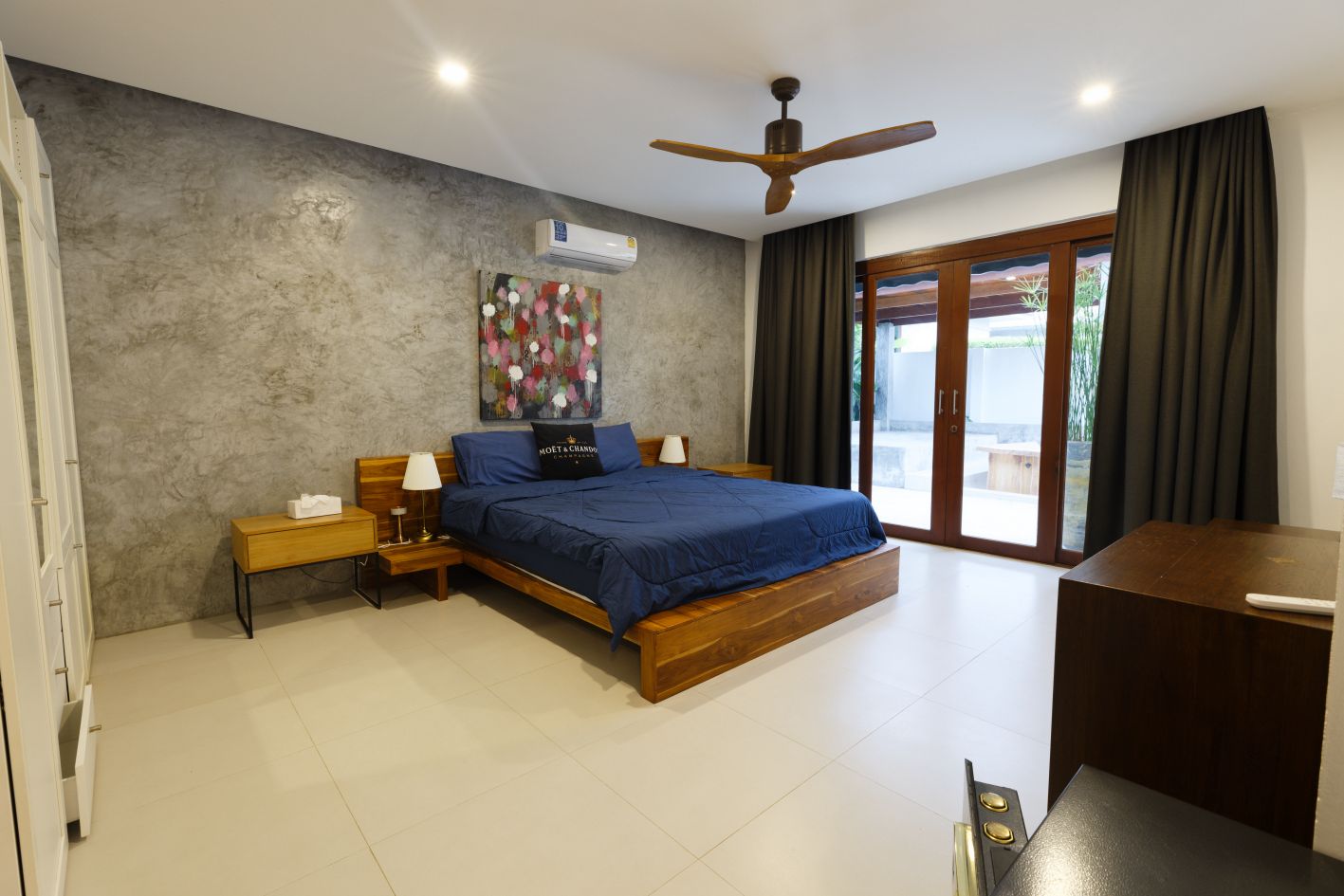 Luxurious 2-bedroom villa with pool in Koh Phangan for sale at 10,5M THB. Features eco-friendly design, solar panels, and serene island living.