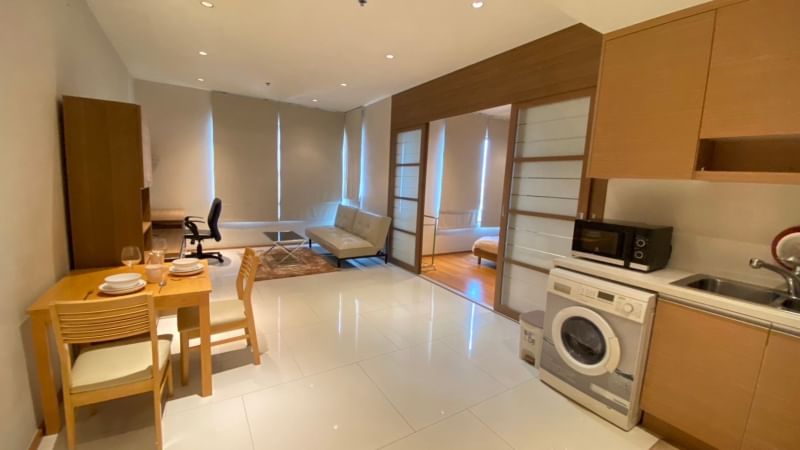 Stunning 1-bedroom, 1-bathroom condo at The Emporio Place Sukhumvit 24. 48.01 sqm, modern design, top amenities, and prime location. Rent for 30,000 THB/month. Contact us now!