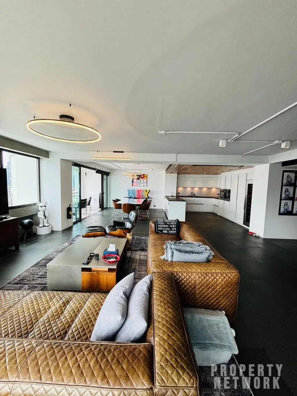 Discover luxury living with this loft-style duplex at The Habitat Sukhumvit 53. Spacious 365 sqm, 3 bedrooms, pet-friendly, and fully renovated. Sale Price: 50M THB. Near BTS Thong Lor