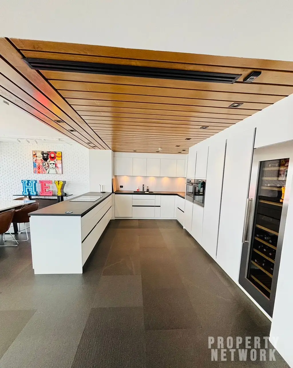 Discover luxury living with this loft-style duplex at The Habitat Sukhumvit 53. Spacious 365 sqm, 3 bedrooms, pet-friendly, and fully renovated. Sale Price: 50M THB. Near BTS Thong Lor