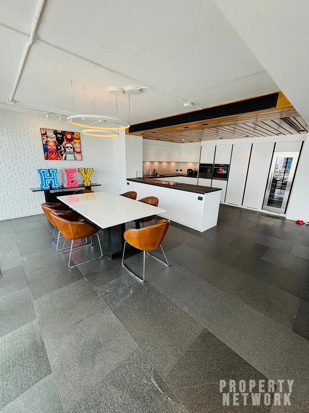 Discover luxury living with this loft-style duplex at The Habitat Sukhumvit 53. Spacious 365 sqm, 3 bedrooms, pet-friendly, and fully renovated. Sale Price: 50M THB. Near BTS Thong Lor
