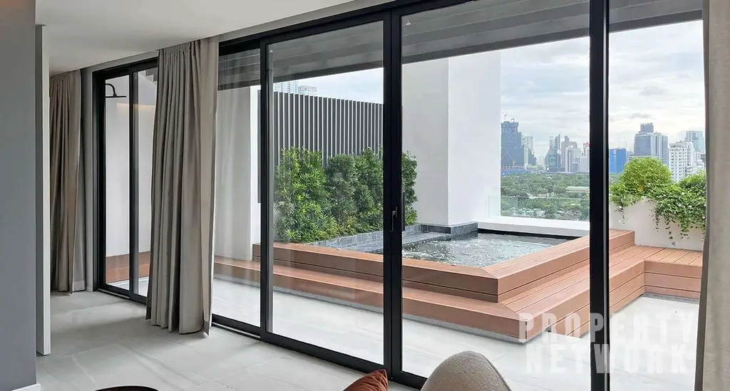 Luxurious 300 sqm duplex at Crystal Garden Condominium, Sukhumvit. 2 bedrooms, 3 baths, private terrace with pool, pet-friendly, and stunning skyline views near BTS Nana Station