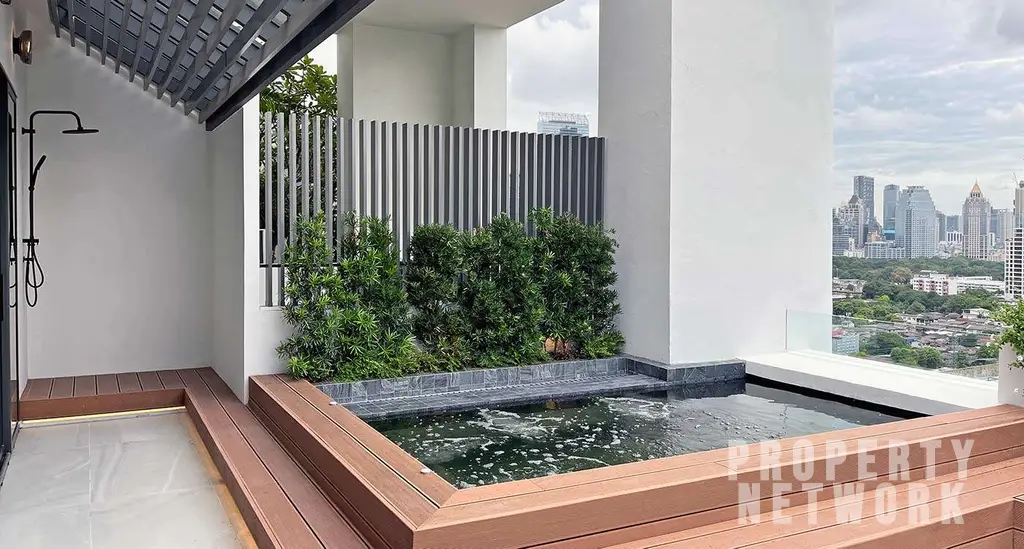 Luxurious 300 sqm duplex at Crystal Garden Condominium, Sukhumvit. 2 bedrooms, 3 baths, private terrace with pool, pet-friendly, and stunning skyline views near BTS Nana Station