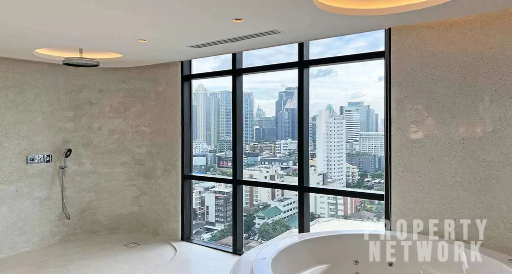 Luxurious 300 sqm duplex at Crystal Garden Condominium, Sukhumvit. 2 bedrooms, 3 baths, private terrace with pool, pet-friendly, and stunning skyline views near BTS Nana Station