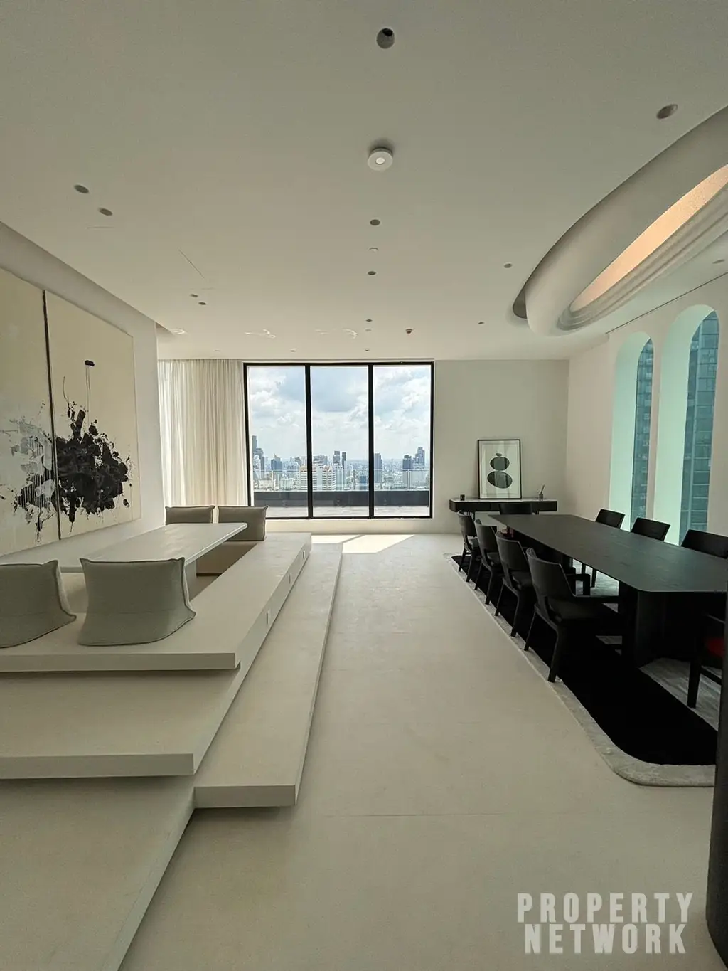 Luxury 4-bedroom, 5-bathroom condo at The Diplomat 39, 450 sqm on the 30th fl. Stunning city views, and high-end amenities. Near BTS Phrom Phong. Sale: 250M THB