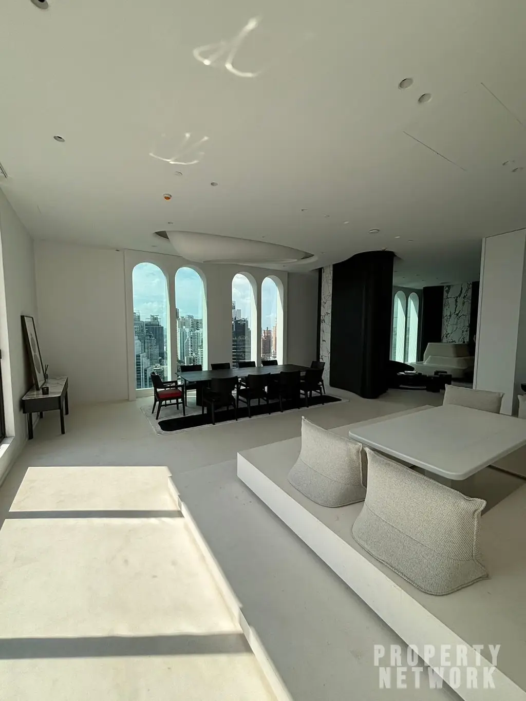 Luxury 4-bedroom, 5-bathroom condo at The Diplomat 39, 450 sqm on the 30th fl. Stunning city views, and high-end amenities. Near BTS Phrom Phong. Sale: 250M THB