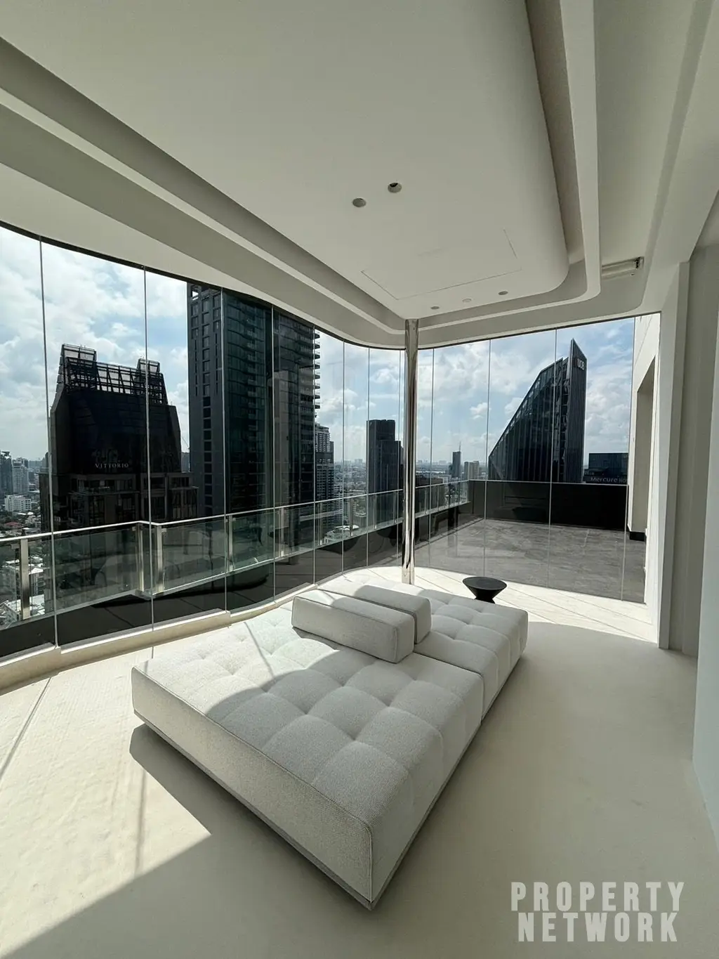 Luxury 4-bedroom, 5-bathroom condo at The Diplomat 39, 450 sqm on the 30th fl. Stunning city views, and high-end amenities. Near BTS Phrom Phong. Sale: 250M THB