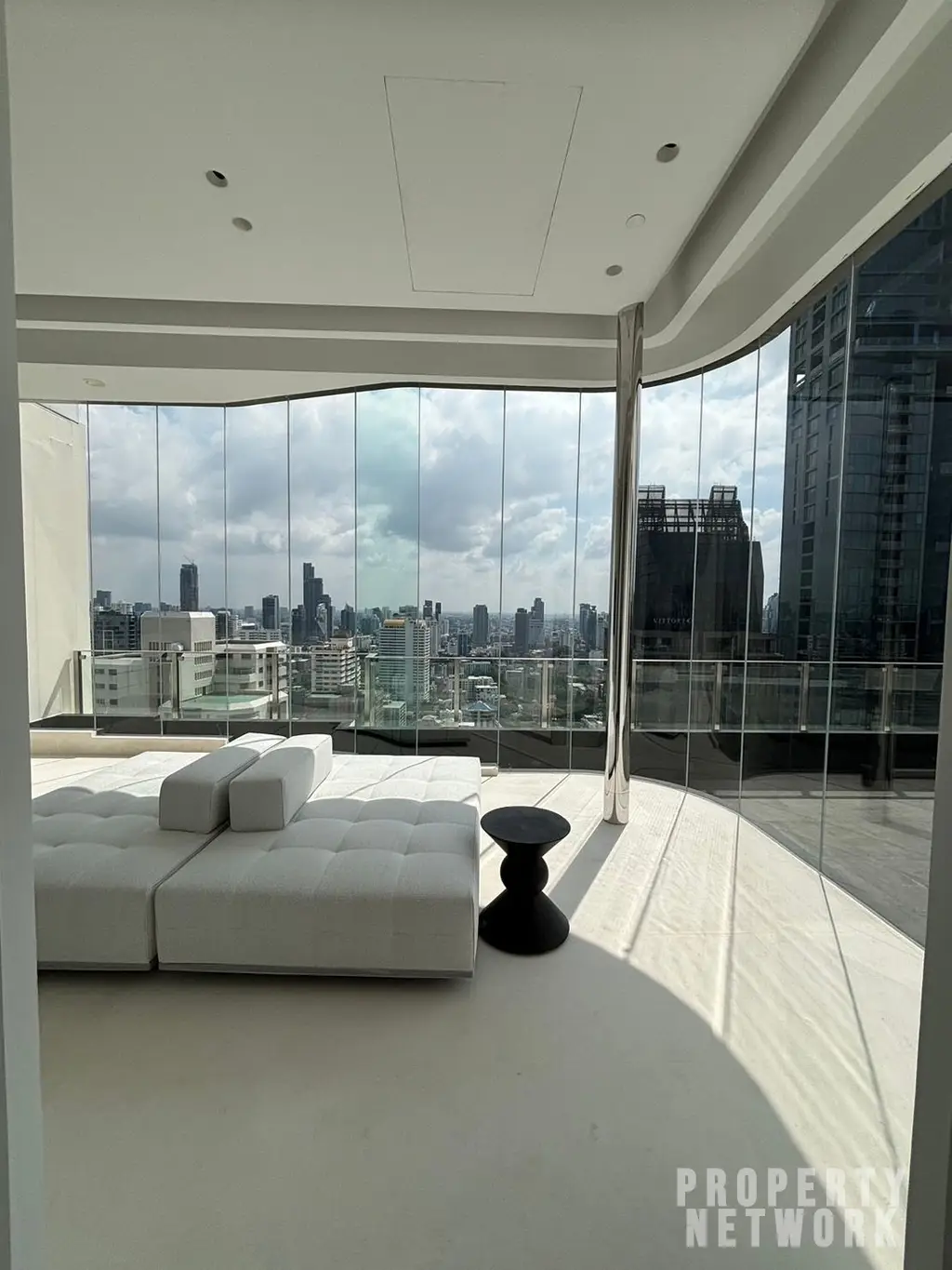 Luxury 4-bedroom, 5-bathroom condo at The Diplomat 39, 450 sqm on the 30th fl. Stunning city views, and high-end amenities. Near BTS Phrom Phong. Sale: 250M THB