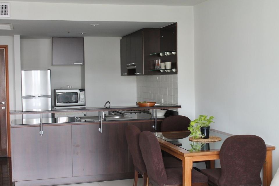 Discover a 1-bedroom, 75 sqm luxury condo for rent at Baan Thirapa. Fully furnished, prime Sathorn location, 30,000 THB/month. Near BTS Chong Nonsi