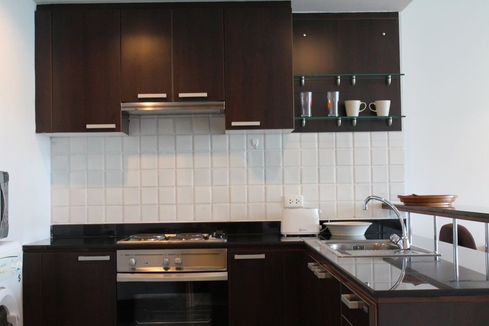Discover a 1-bedroom, 75 sqm luxury condo for rent at Baan Thirapa. Fully furnished, prime Sathorn location, 30,000 THB/month. Near BTS Chong Nonsi