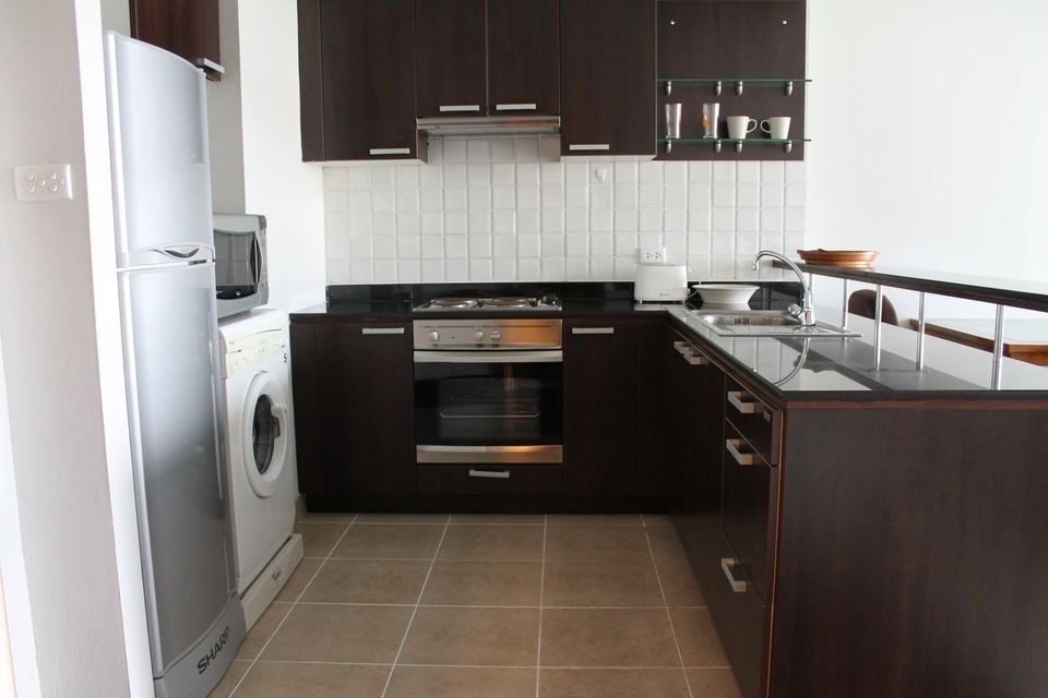 Discover a 1-bedroom, 75 sqm luxury condo for rent at Baan Thirapa. Fully furnished, prime Sathorn location, 30,000 THB/month. Near BTS Chong Nonsi