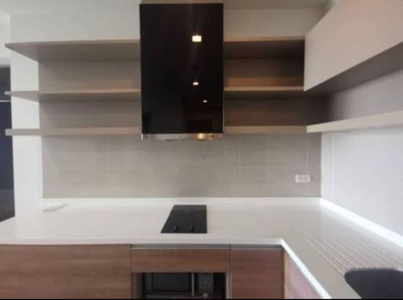 Spacious 2-bedroom condo for rent at Rhythm Sukhumvit 50, fully furnished, 65 sqm, 9th floor, THB 35K/month. Modern amenities and prime location near BTS On Nut