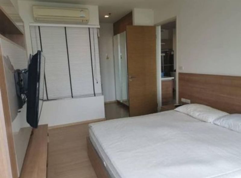 Spacious 2-bedroom condo for rent at Rhythm Sukhumvit 50, fully furnished, 65 sqm, 9th floor, THB 35K/month. Modern amenities and prime location near BTS On Nut