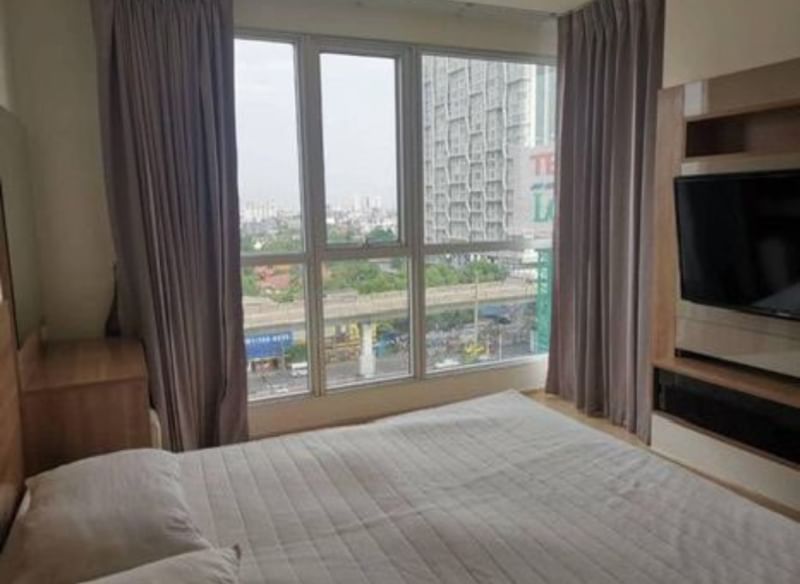 Spacious 2-bedroom condo for rent at Rhythm Sukhumvit 50, fully furnished, 65 sqm, 9th floor, THB 35K/month. Modern amenities and prime location near BTS On Nut