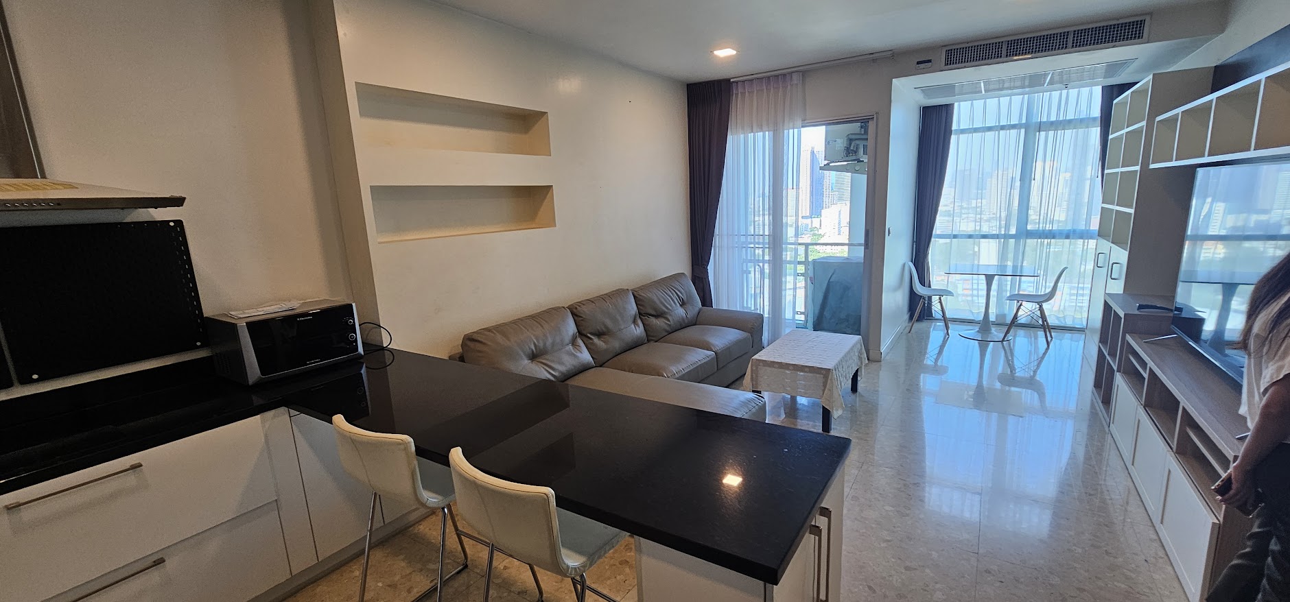 1-bedroom, 2-bath condo at Nusasiri Grand, 80 sqm, steps from BTS Ekkamai. Rent for 35,000 THB/month. Prime location, luxury living.