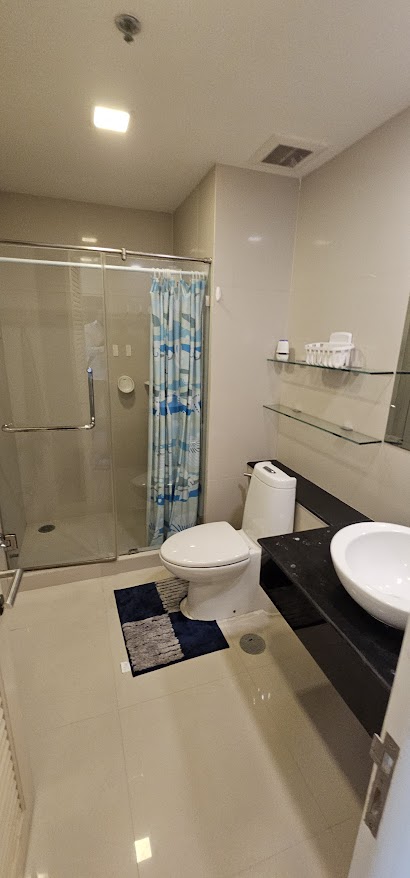 1-bedroom, 2-bath condo at Nusasiri Grand, 80 sqm, steps from BTS Ekkamai. Rent for 35,000 THB/month. Prime location, luxury living.