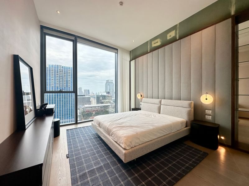 Luxury 2-bedroom condo at SCOPE Langsuan, 155 sqm, for sale at 128M THB. Prime location in Bangkok, near shopping malls, BTS, and dining spots.