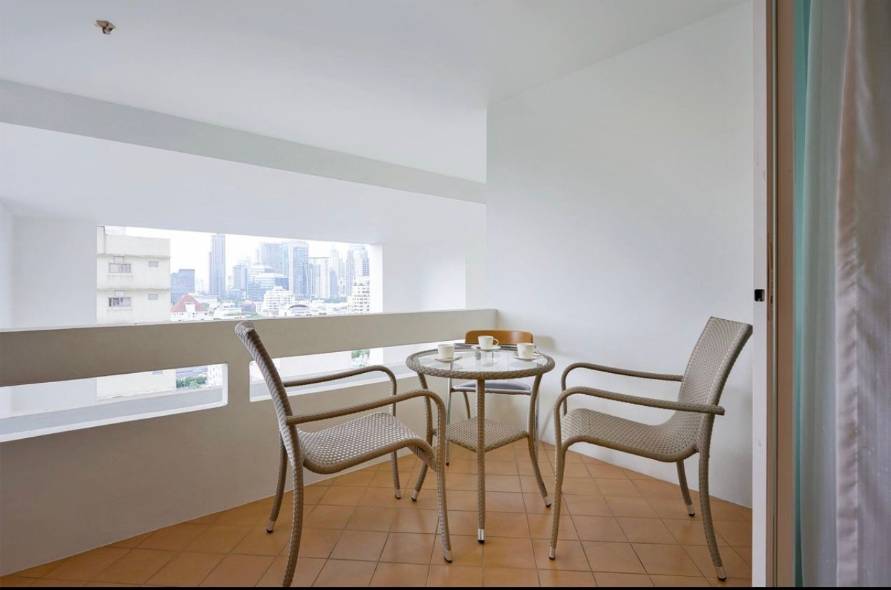 Spacious 2-bedroom, 2-bathroom condo at Crystal Garden, 110 sqm, 58,000 THB/month. Close to BTS Nana with top-notch amenities.