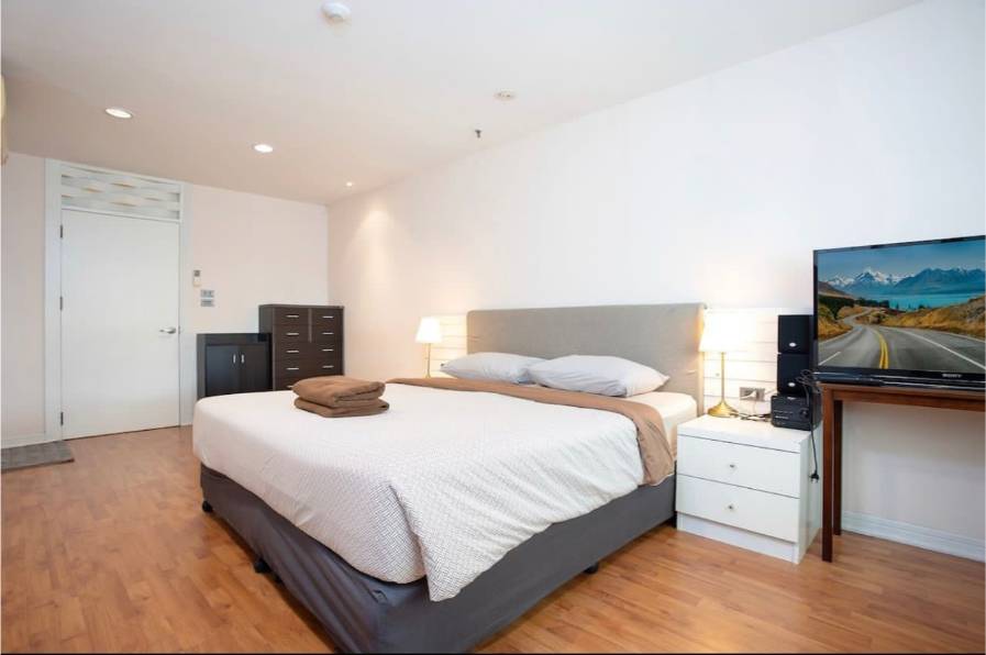 Spacious 2-bedroom, 2-bathroom condo at Crystal Garden, 110 sqm, 58,000 THB/month. Close to BTS Nana with top-notch amenities.