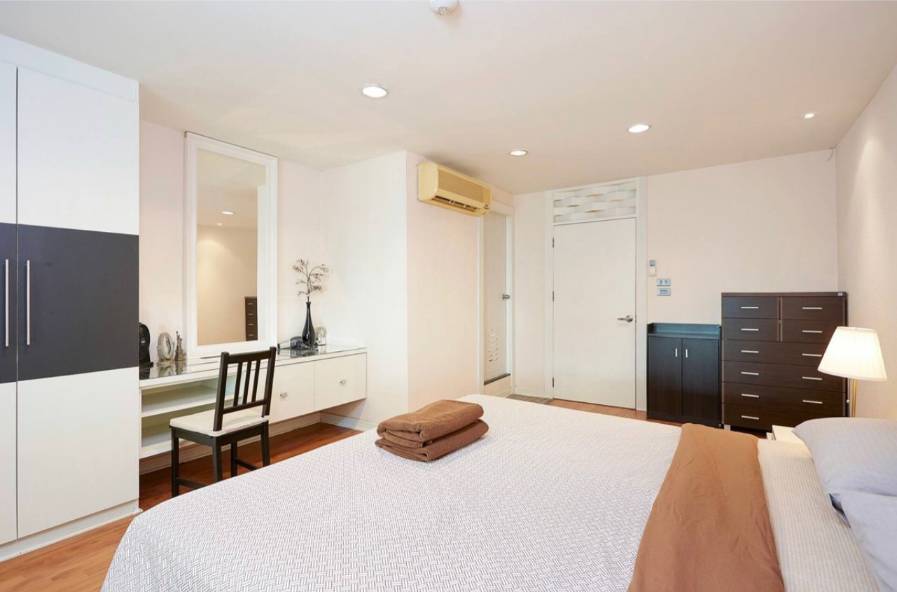 Spacious 2-bedroom, 2-bathroom condo at Crystal Garden, 110 sqm, 58,000 THB/month. Close to BTS Nana with top-notch amenities.