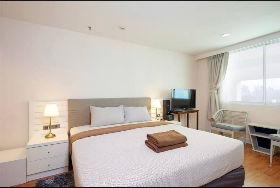 Spacious 2-bedroom, 2-bathroom condo at Crystal Garden, 110 sqm, 58,000 THB/month. Close to BTS Nana with top-notch amenities.