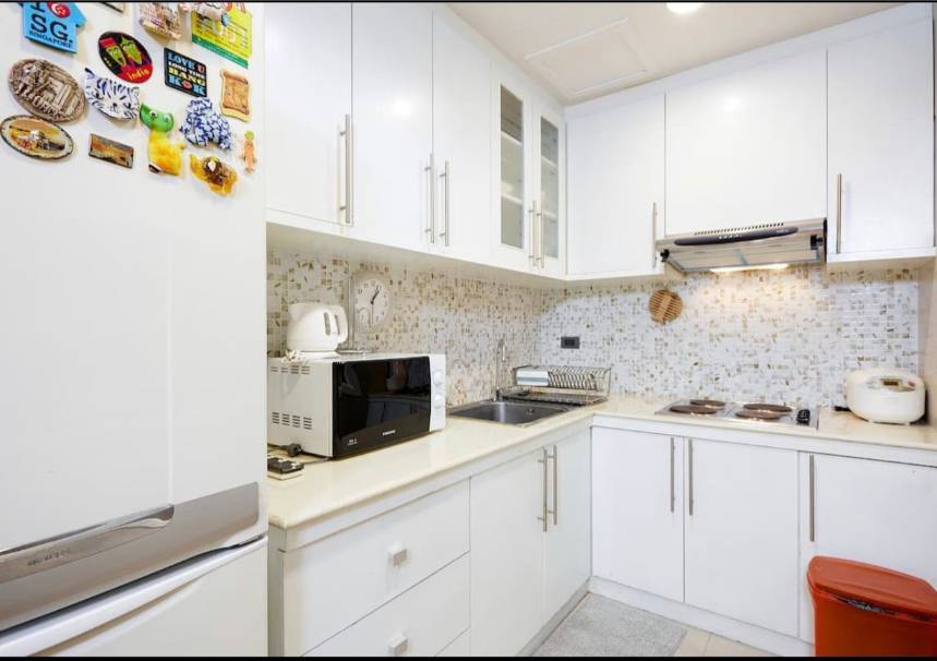 Spacious 2-bedroom, 2-bathroom condo at Crystal Garden, 110 sqm, 58,000 THB/month. Close to BTS Nana with top-notch amenities.