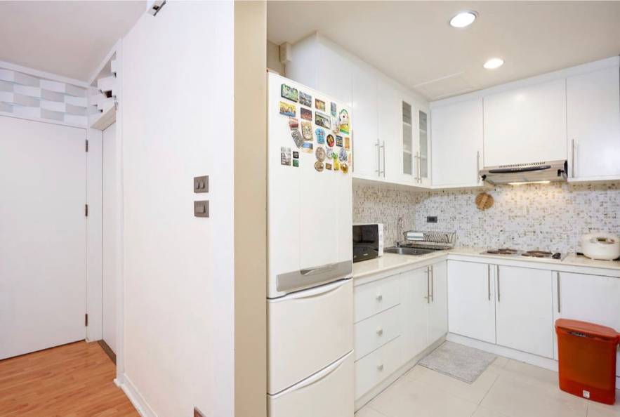 Spacious 2-bedroom, 2-bathroom condo at Crystal Garden, 110 sqm, 58,000 THB/month. Close to BTS Nana with top-notch amenities.