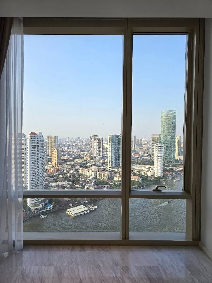 Luxury 2-bedroom, 3-bathroom condo for rent at Four Seasons Private Residences Bangkok. 32nd floor, 117 sqm, river views. Rent: 250,000 THB/month.