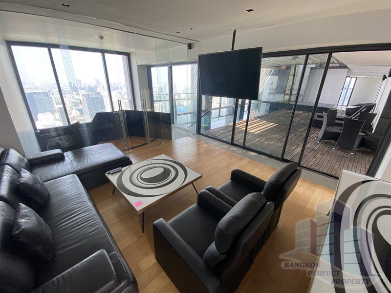 Luxurious 4-bedroom triplex penthouse at The Met Condo Sathorn for rent. Features private lift, pool, salon, and maid’s quarter. Rent 450,000 THB/month.
