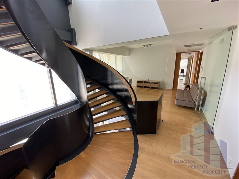 Luxurious 4-bedroom triplex penthouse at The Met Condo Sathorn for rent. Features private lift, pool, salon, and maid’s quarter. Rent 450,000 THB/month.