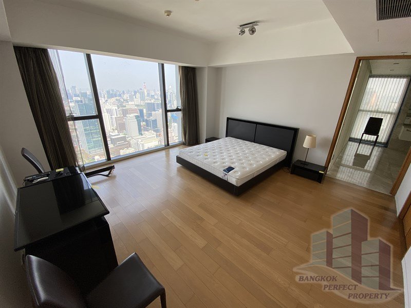 Luxurious 4-bedroom triplex penthouse at The Met Condo Sathorn for rent. Features private lift, pool, salon, and maid’s quarter. Rent 450,000 THB/month.