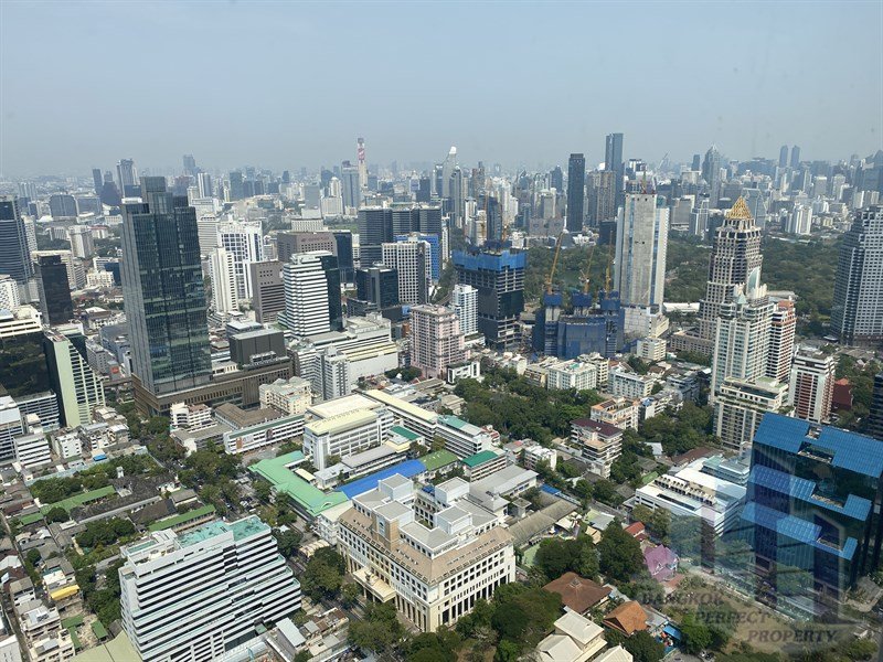 Luxurious 4-bedroom triplex penthouse at The Met Condo Sathorn for rent. Features private lift, pool, salon, and maid’s quarter. Rent 450,000 THB/month.