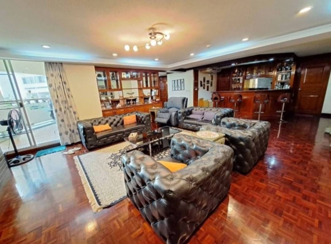 Spacious 4-bedroom condo at Tai Ping Towers, 252 sqm, fully furnished. Prime Ekamai location near BTS. Rent: 60,000 THB/month. Excellent amenities.