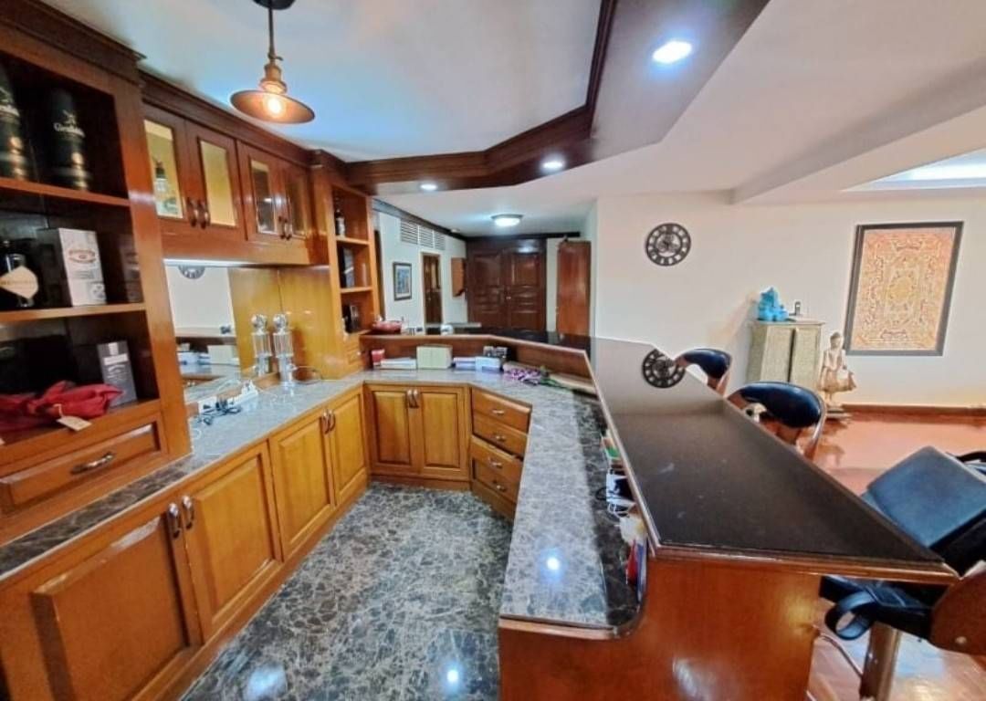 Spacious 4-bedroom condo at Tai Ping Towers, 252 sqm, fully furnished. Prime Ekamai location near BTS. Rent: 60,000 THB/month. Excellent amenities.