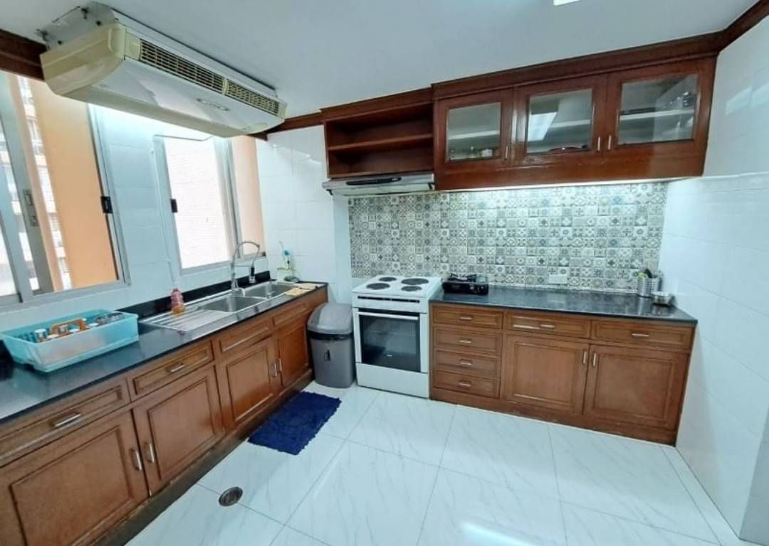 Spacious 4-bedroom condo at Tai Ping Towers, 252 sqm, fully furnished. Prime Ekamai location near BTS. Rent: 60,000 THB/month. Excellent amenities.