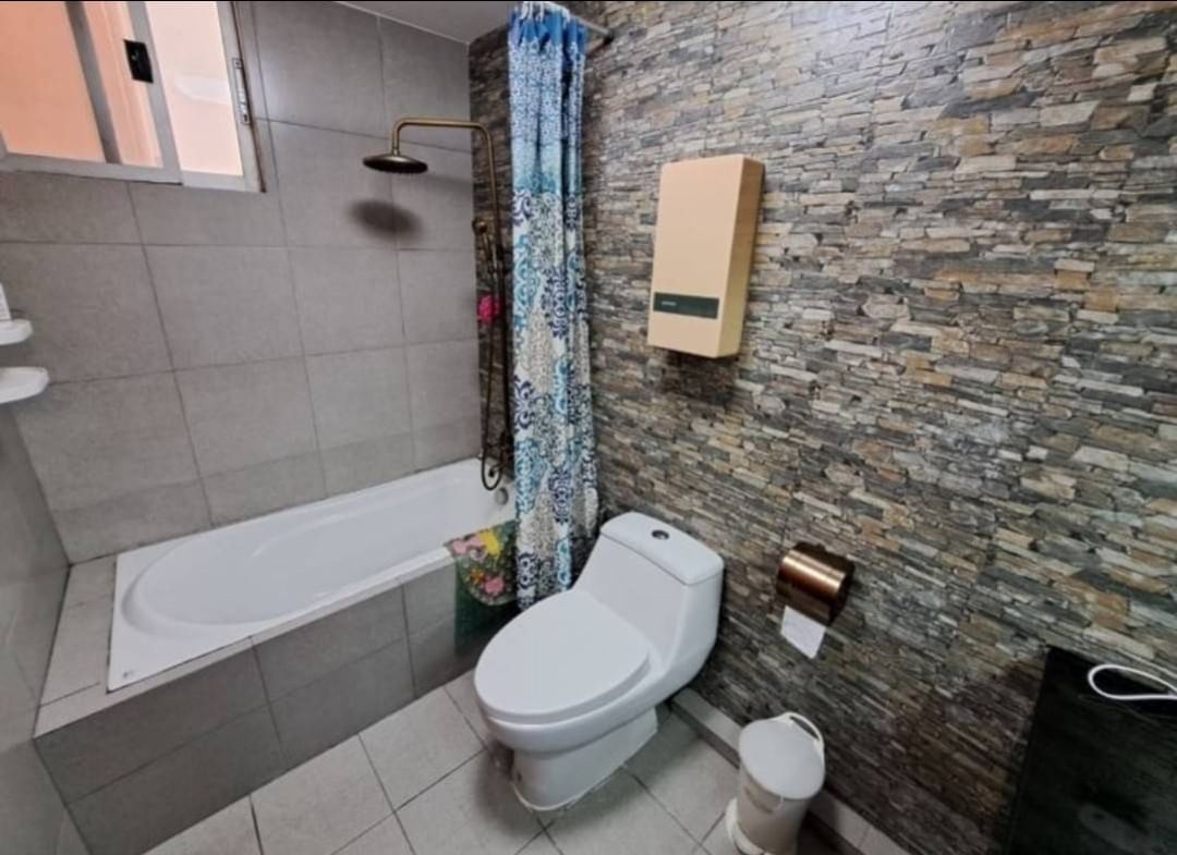 Spacious 4-bedroom condo at Tai Ping Towers, 252 sqm, fully furnished. Prime Ekamai location near BTS. Rent: 60,000 THB/month. Excellent amenities.