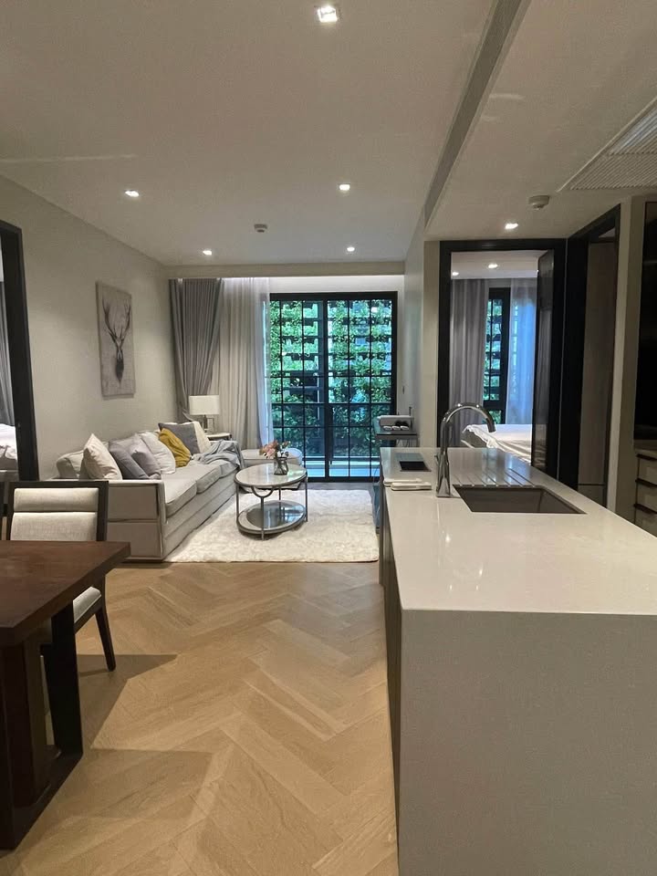2-BR Condo at The Reserve Sukhumvit 61, 75 sqm, low floor, near BTS Ekkamai. Rent: 75,000 THB/month. Fully furnished with luxury amenities.