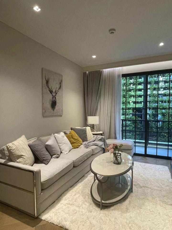 2-BR Condo at The Reserve Sukhumvit 61, 75 sqm, low floor, near BTS Ekkamai. Rent: 75,000 THB/month. Fully furnished with luxury amenities.