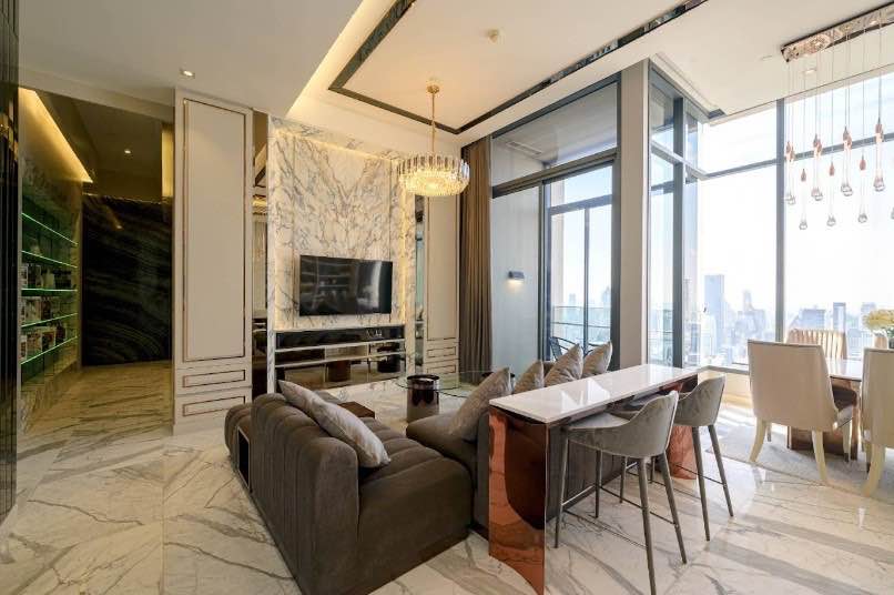 Luxurious 3-BR Condo at The ESSE Asoke, 157 sqm, high floor with panoramic views. Rent: 180,000 THB/month or Sale: 60M THB. Prime location near BTS Asok.