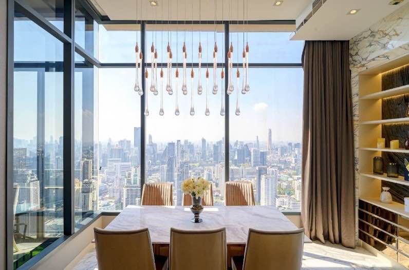Luxurious 3-BR Condo at The ESSE Asoke, 157 sqm, high floor with panoramic views. Rent: 180,000 THB/month or Sale: 60M THB. Prime location near BTS Asok.