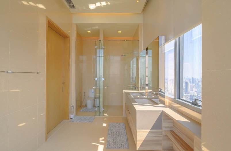 Luxurious 3-BR Condo at The ESSE Asoke, 157 sqm, high floor with panoramic views. Rent: 180,000 THB/month or Sale: 60M THB. Prime location near BTS Asok.