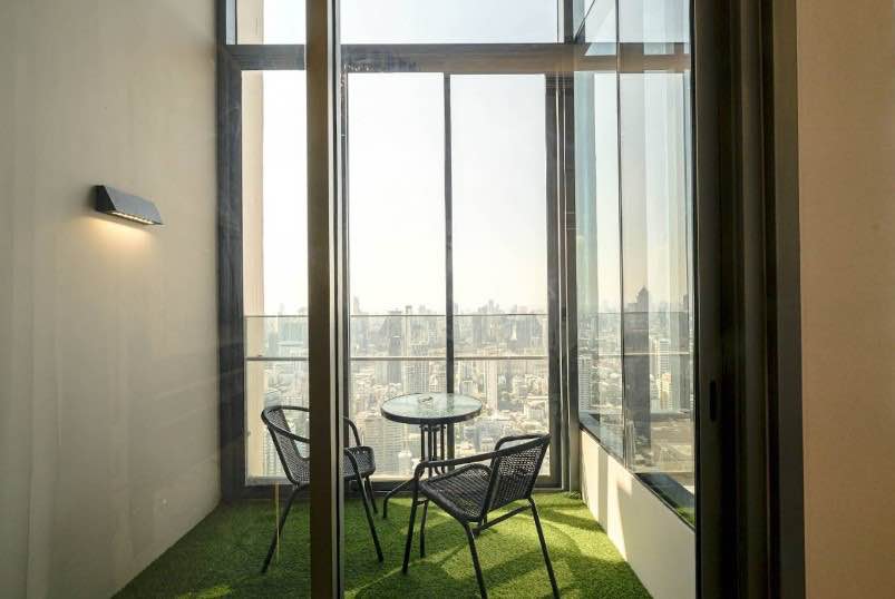 Luxurious 3-BR Condo at The ESSE Asoke, 157 sqm, high floor with panoramic views. Rent: 180,000 THB/month or Sale: 60M THB. Prime location near BTS Asok.
