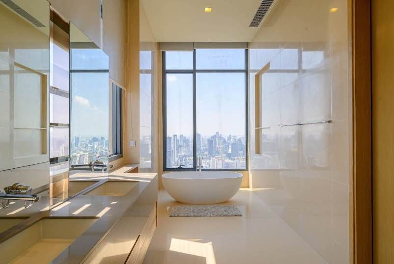 Luxurious 3-BR Condo at The ESSE Asoke, 157 sqm, high floor with panoramic views. Rent: 180,000 THB/month or Sale: 60M THB. Prime location near BTS Asok.