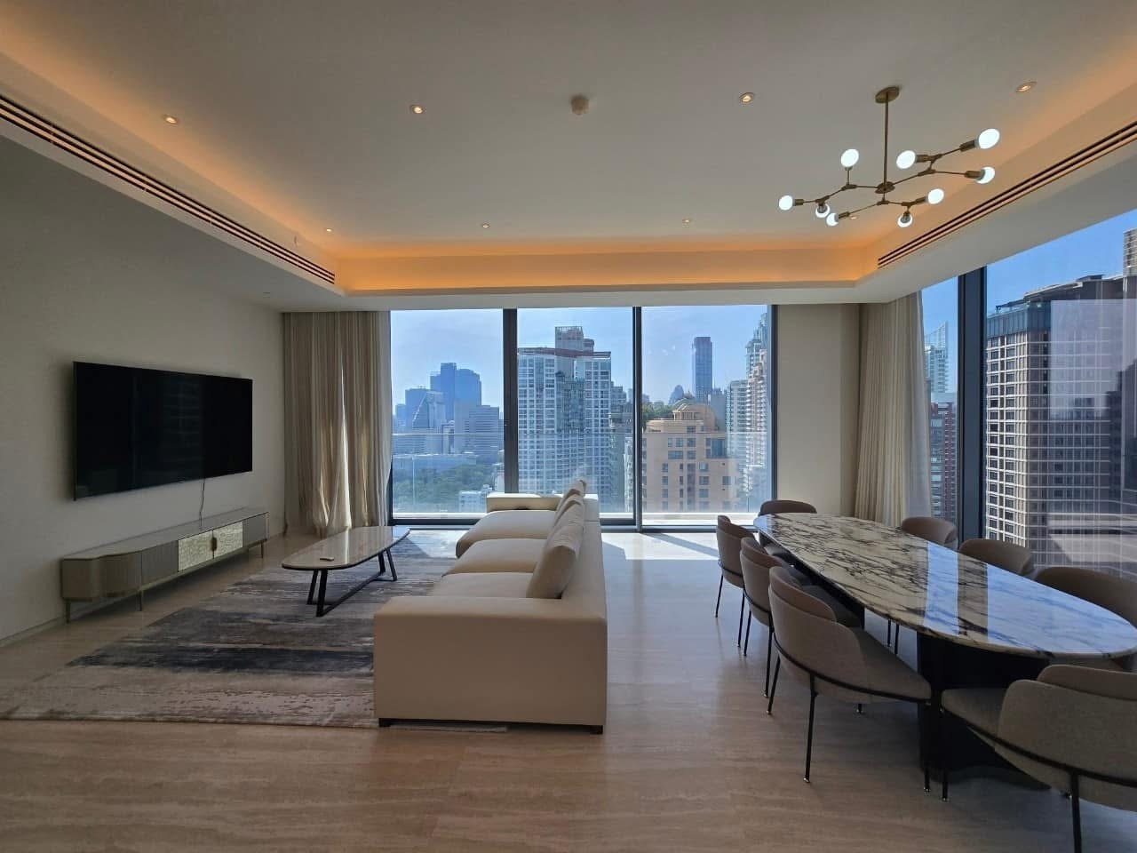 Luxury 3-bed, 3-bath condo at Scope Langsuan, 241 sqm, for rent at 480,000 THB/month. Prime location near BTS Ploenchit, with top-tier amenities and security.