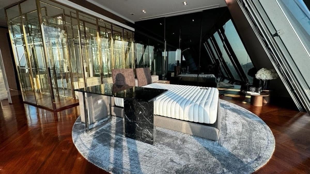 Rent this luxurious 3-bedroom, 4-bathroom penthouse at MARQUE Sukhumvit, 297 sqm, with private pool and elevator. Available for 700,000 THB/month. Prime location