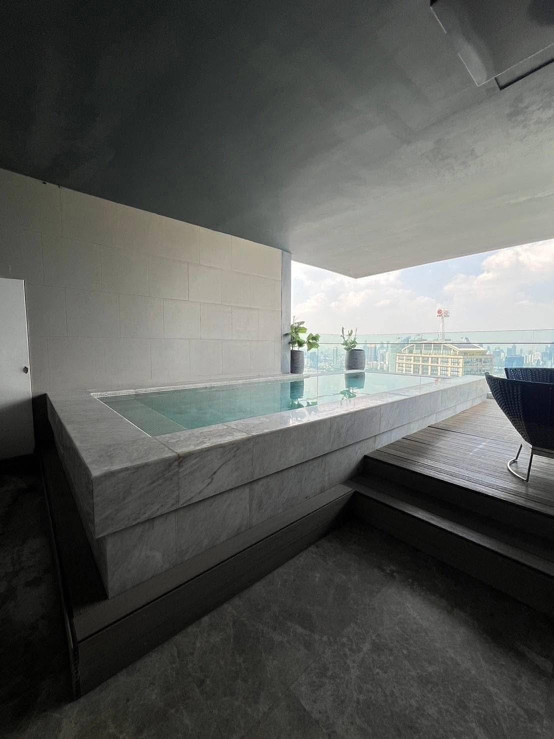 Rent this luxurious 3-bedroom, 4-bathroom penthouse at MARQUE Sukhumvit, 297 sqm, with private pool and elevator. Available for 700,000 THB/month. Prime location